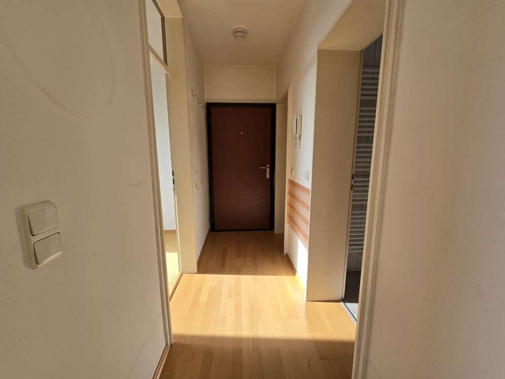 Immobilie in Nauheim - Helle 4 Zimmerwohnung mit Blick über Nauheim - Bild 1