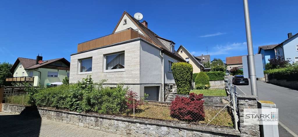 Immobilie in Kleinrinderfeld - Familienfreundliches Zuhause mit Garten, Dachterrasse und Garage in ruhiger Lage - Bild 2