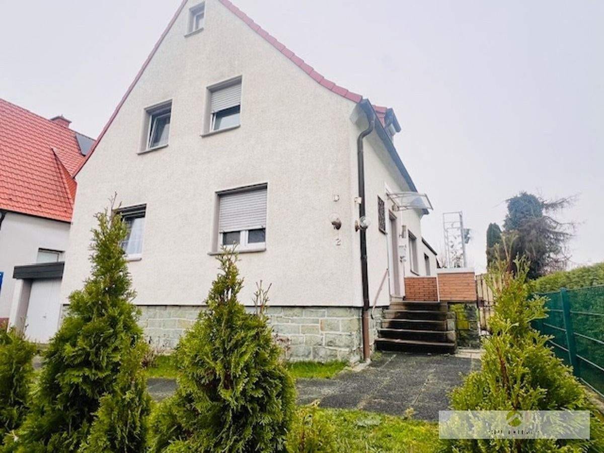 Immobilie in Werl - Ein-/Zweifamilienhaus mit Gartenidylle und Ausbaupotential in Werl-Büderich zu verkaufen! - Bild 0