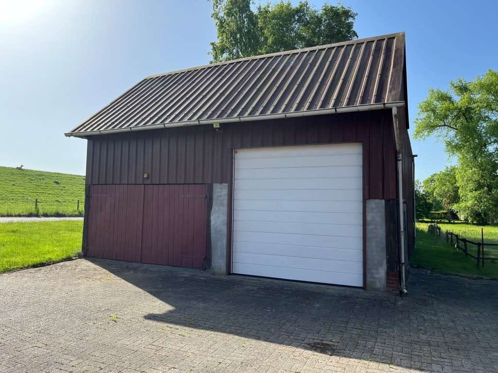 Immobilie in Brake - Reetgedeckte Rarität direkt am Weserdeich in Brake-Golzwarden - Bild 3