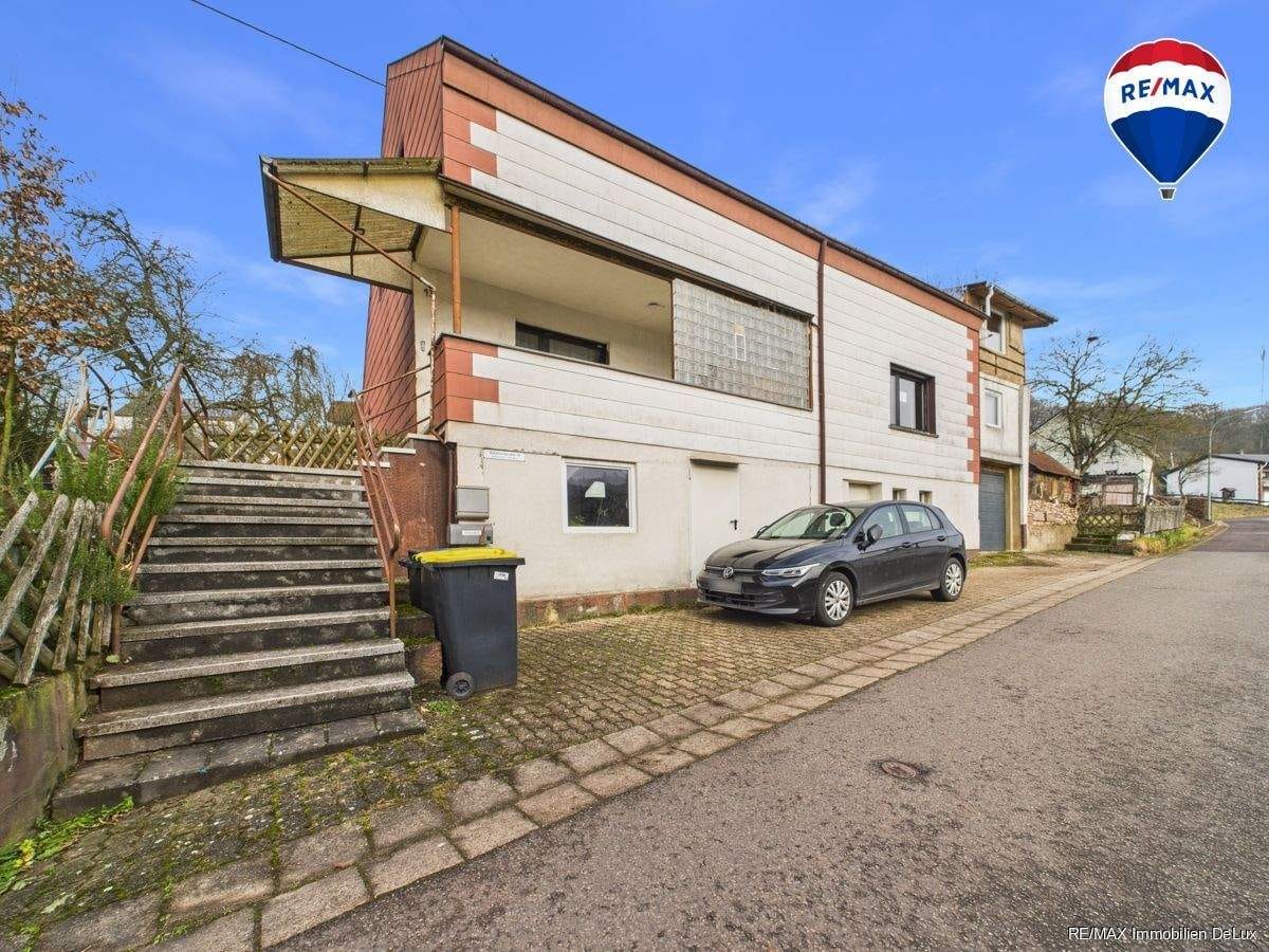Immobilie in Schmelz - Wohnhaus in Schmelz-Limbach mit vielseitigen Nutzungsmöglichkeiten - Bild 0