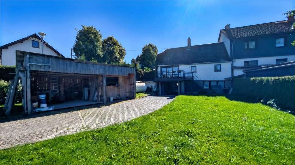 Immobilie in Drognitz - Auf dem Land ankommen: Liebevoll gestaltetes Haus, großer Garten, weiter Blick in Lothra - Bild 4