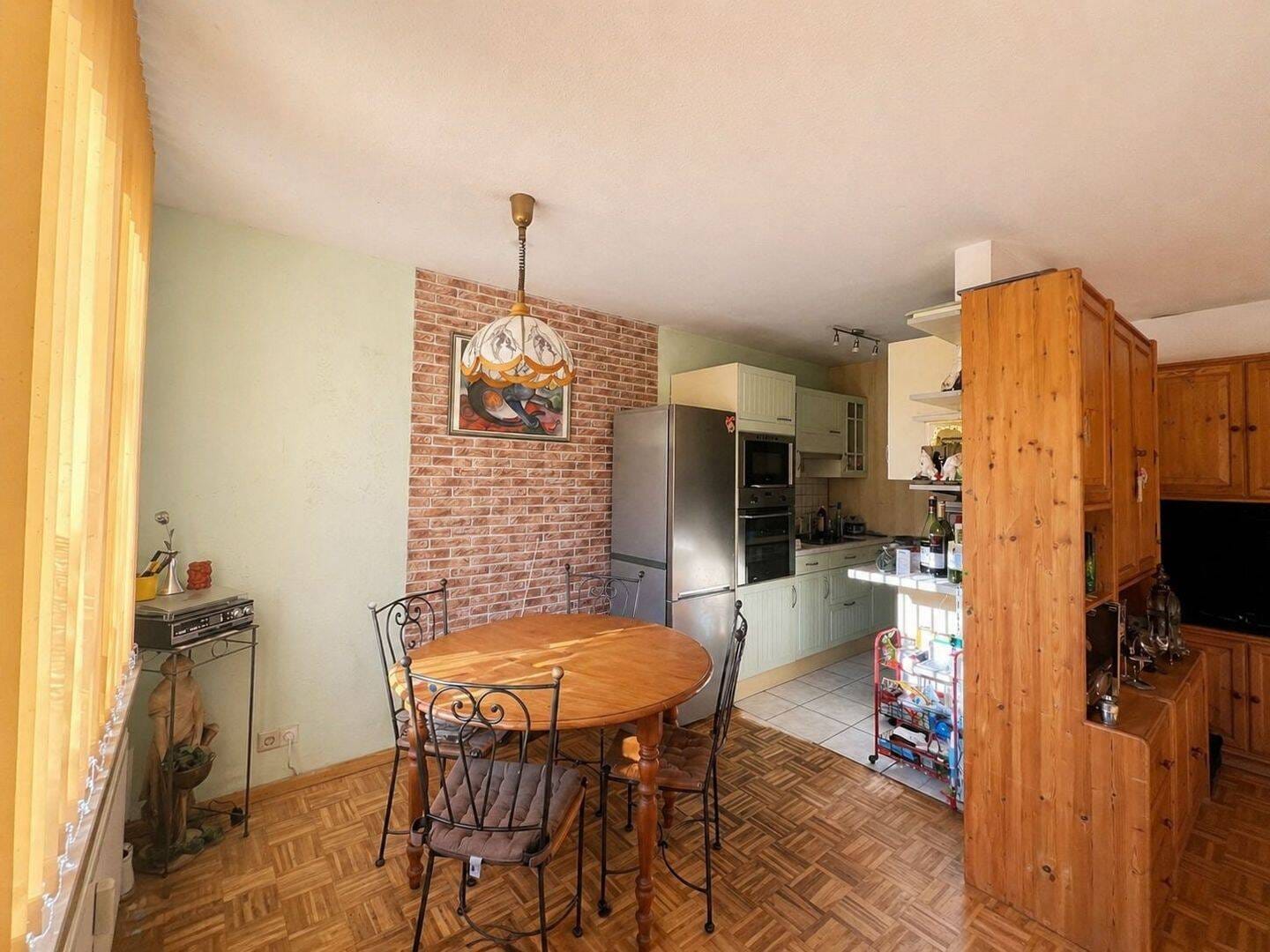 Immobilie in Schliengen - Blick ins Grüne – charmante 2-Zimmer-Wohnung mit Süd-Balkon und Stellplätzen - Bild 3