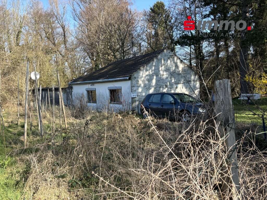 Immobilie in Aachen - Kleines, sanierungsbedürftiges Einfamilienhaus auf schönem Grundstück - Bild 0