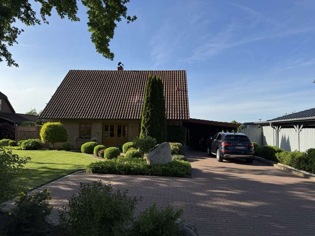 Immobilie in Burg (Dithmarschen) - Lebensqualität und Familienglück garantiert: Gepflegtes EFH in ruhiger Wohnlage mit Wintergarten! - Bild 0