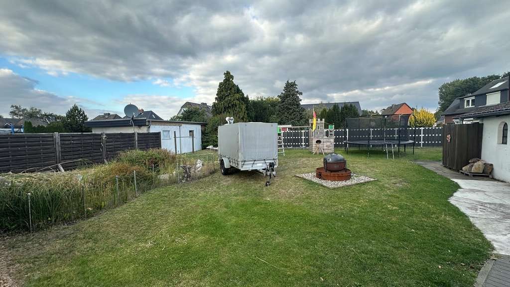 Immobilie in Moorrege - Solides, kleines Mehrfamilienhaus mit Vollkeller und Doppelgarage in Moorrege - Bild 4