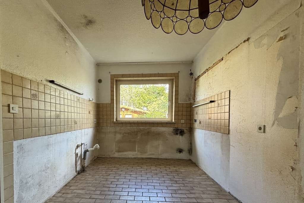 Immobilie in Bad Schwartau - Charmantes Mittelreihenhaus mit Potential in ruhiger Wohnlage - Bild 4