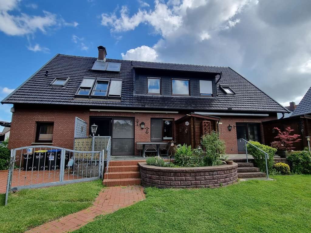 Immobilie in Hille - Zweifamilienhaus mit Scheune und Remise 
in Hille-Hartum

 - Bild 0
