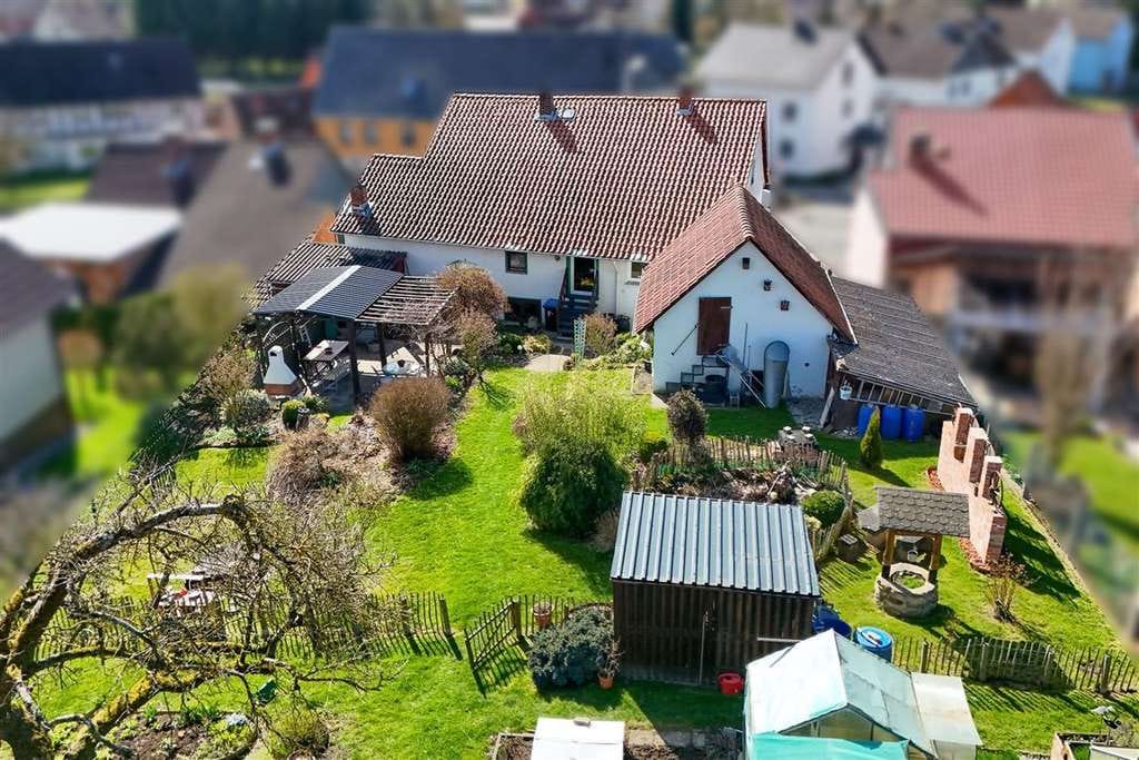 Immobilie in Kalefeld - Ihr neues Zuhause: Großzügiges Einfamilienhaus mit idyllischem Gartenparadies - Bild 3