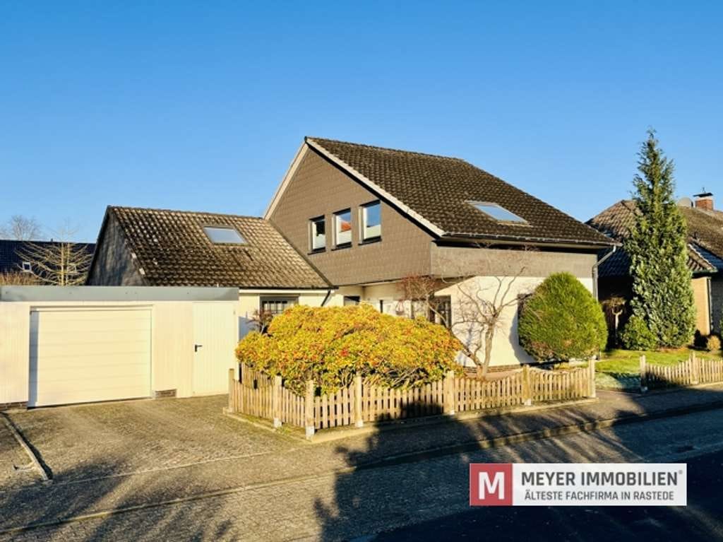 Immobilie in Rastede - Gepflegtes Einfamilienhaus mit Wintergarten und Teichanlage! (Obj.-Nr. 6584) - Bild 1