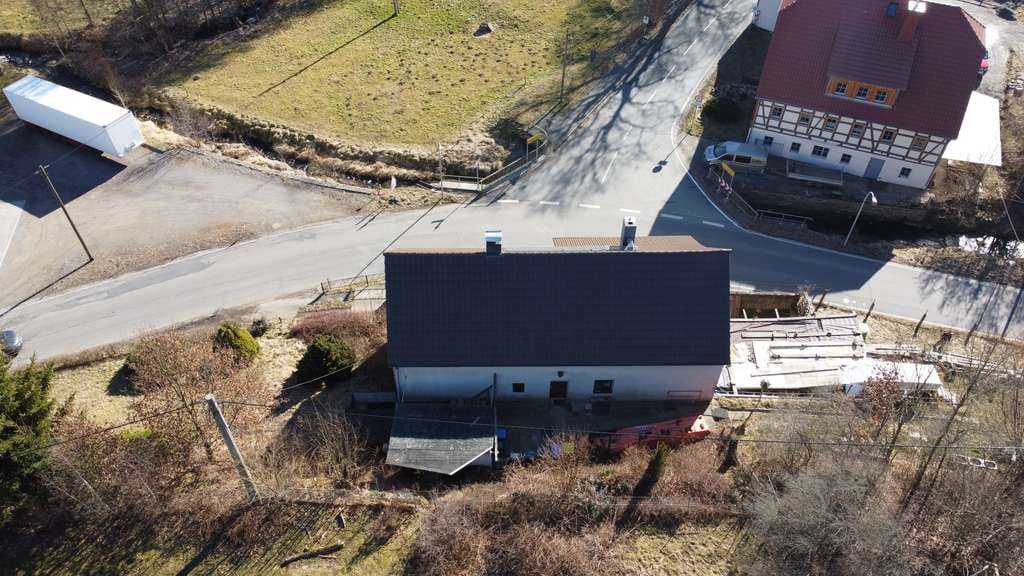 Immobilie in Mulda/Sachsen - Einfamilienhaus mit Potential - Wohnen am Helbigsdorfer Bach mit ausbaufähigem Dachgeschoss - Bild 1