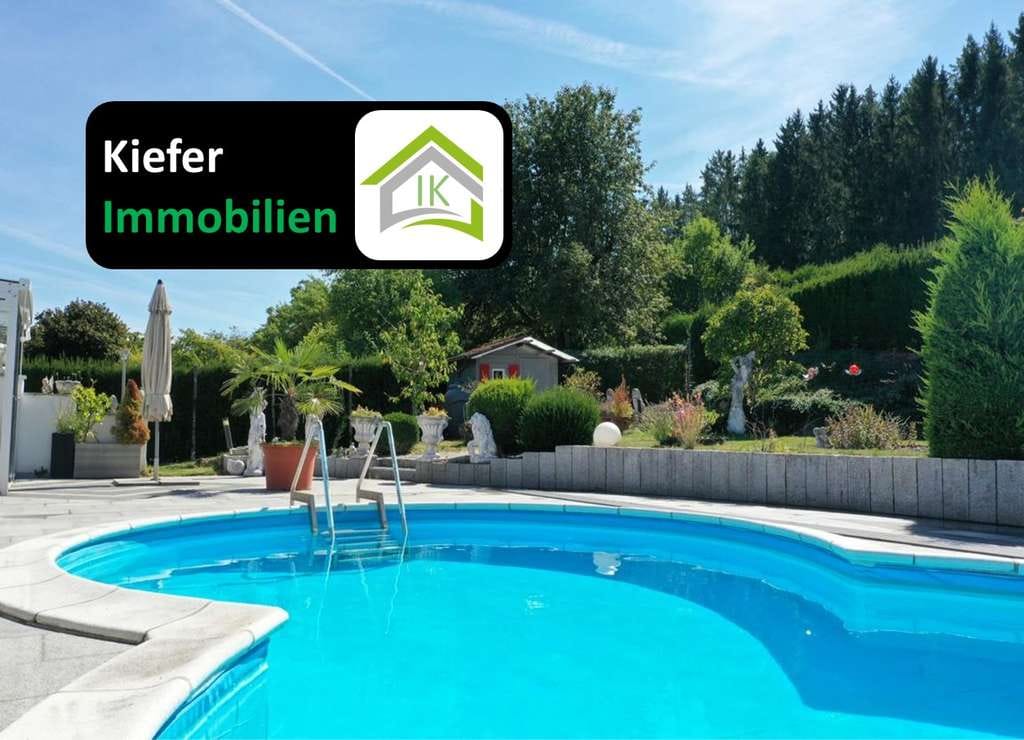 Immobilie in Waldachtal - Einfamilienhaus mit traumhaften Pool und Gartenparadies - Bild 0