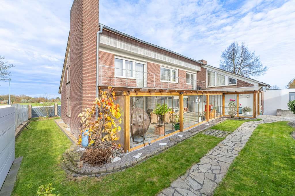 Immobilie in Ahaus - Attraktives Zweifamilienhaus mit Wellness- und Fitnessbereich – Ihr persönliches Paradies zum Entspa - Bild 1