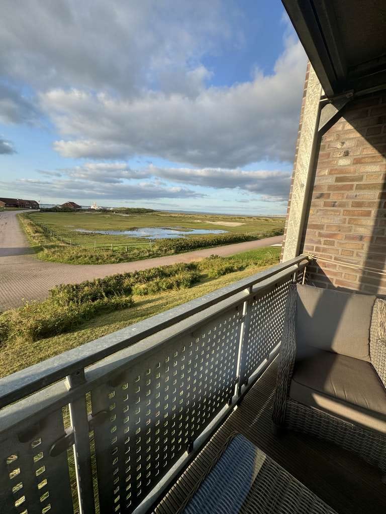 Immobilie in Baltrum - Süd-Balkon mit Wattenmeerblick – Rückzugsort auf Baltrum - Bild 1