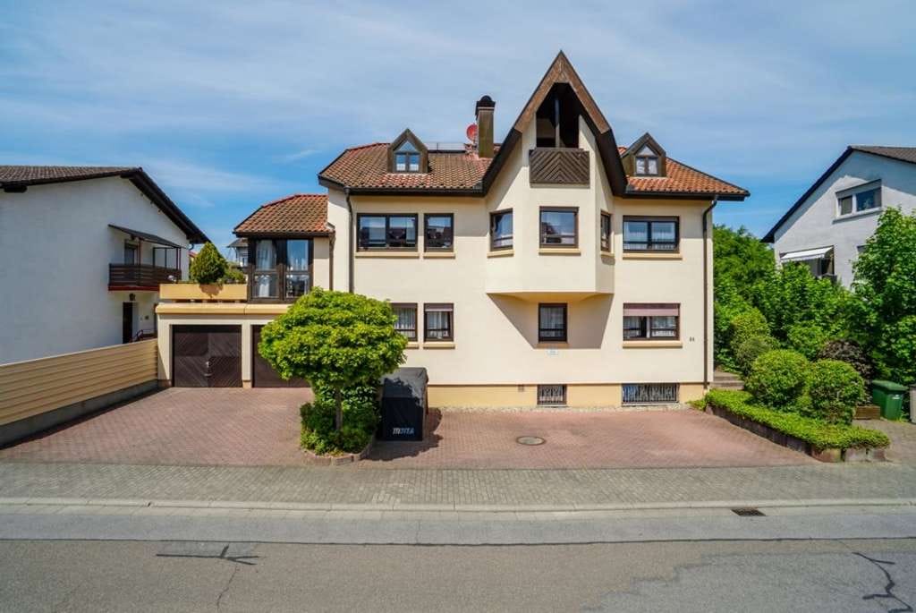 Immobilie in Mörlenbach - Dreifamilienhaus mit zwei vermieteten Einheiten und einer Doppelgarage! - Bild 3
