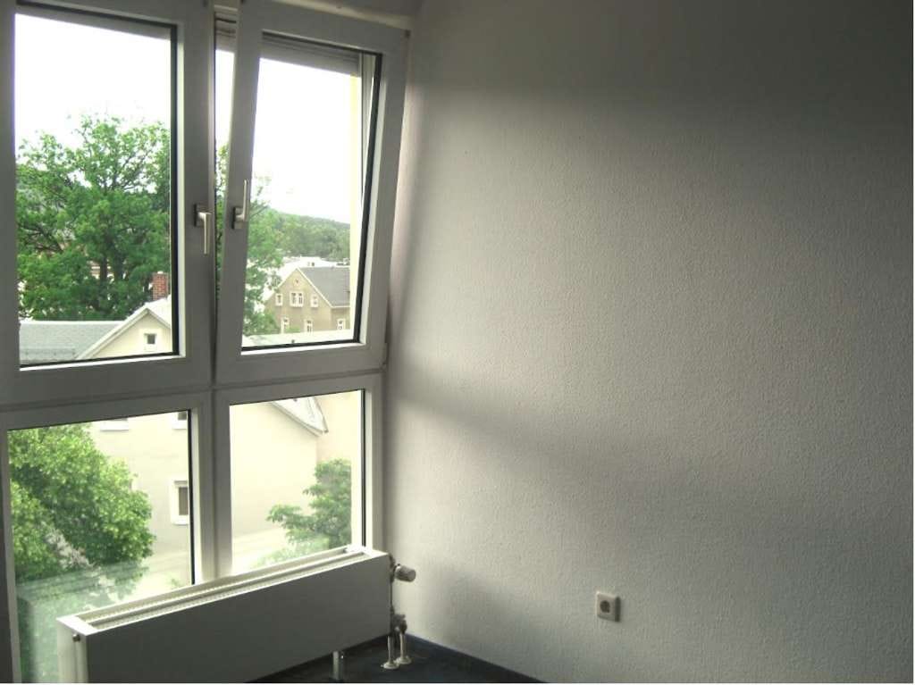 Immobilie in Thalheim/Erzgebirge - Vermietete 4-Zimmer-Eigentumswohnung mit TG-Stellplatz - Bild 2