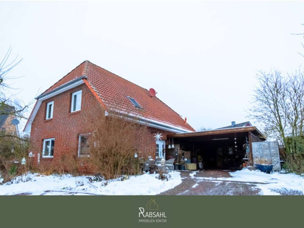 Immobilie in Bienenbüttel - Attraktives Einfamilienhaus mit wundervollem Garten und Doppelcarport - Feldrandlage in Bienenbüttel - Bild 0