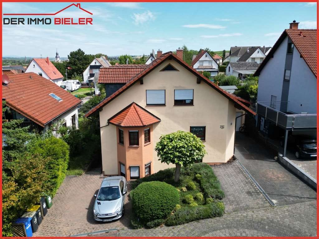 Immobilie in Saulheim - Modern, groß und gepflegt - EFH mit Wintergarten und ELW in Saulheim zu verkaufen - Bild 3