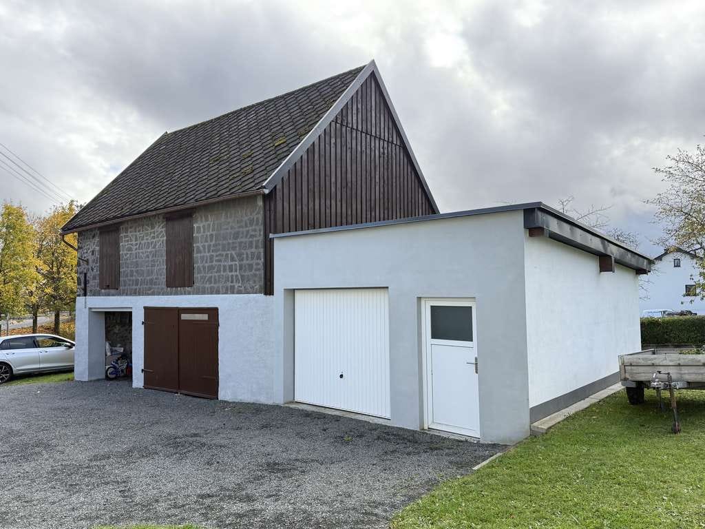 Immobilie in Oberstadtfeld - Gemütliches Einfamilienhaus mit Scheune, Garage und großen Grundstück - Bild 1