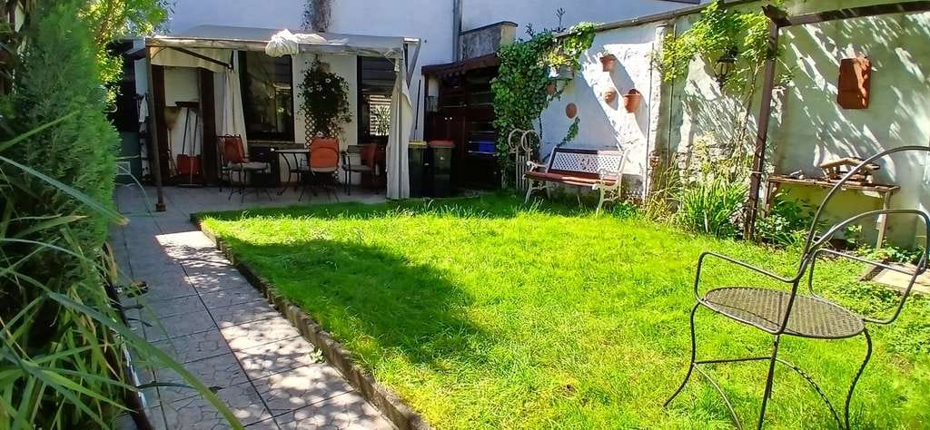 Immobilie in Krefeld - Reihenmittelhaus in Krefeld-Stadtmitte mit Garage & Gartenoase - Bild 1