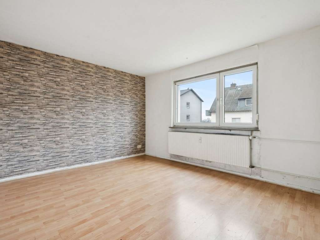 Immobilie in Nordstemmen - Nordstemmen-Heyersum: Zweifamilienhaus mit Garage auf ca. 833 m² großem Grundstück - Bild 3