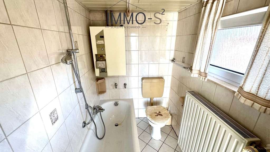 Immobilie in Mehlingen - Einfamilienhaus mit großem Entwicklungspotenzial auf 490 m² Grundstück in Mehlingen - Bild 3