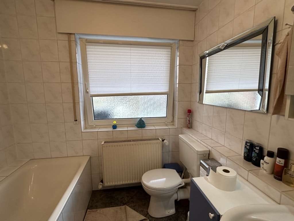 Immobilie in Harsewinkel - Individuelle Single-Wohnung mit kleinem "Garten" + Tiefgaragenstellplatz/Ideal für den Lebensabend - Bild 4