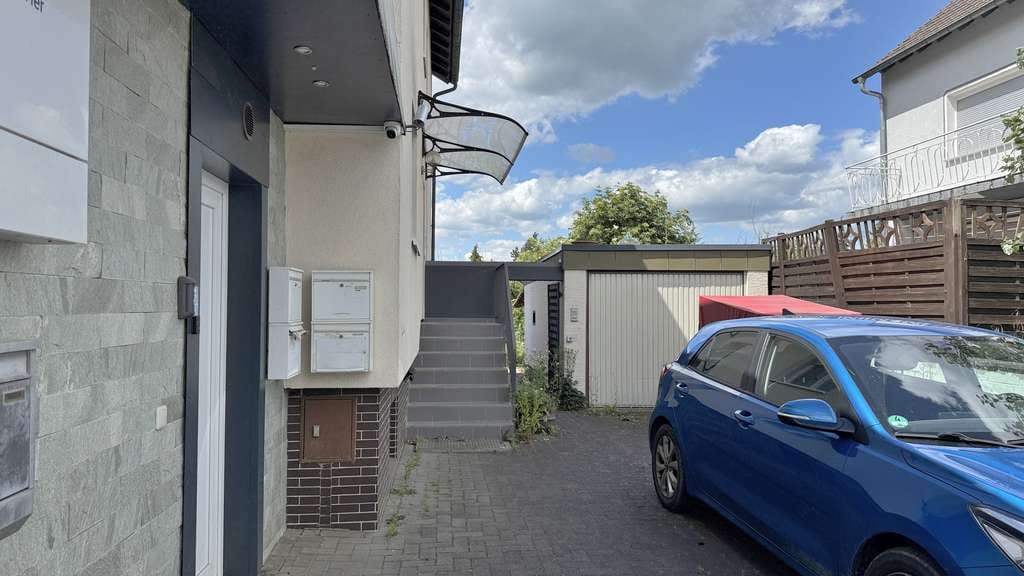 Immobilie in Limeshain - Mehrfamilienhaus mit 4 Wohneinheiten und  Ladenfläche - Bild 1