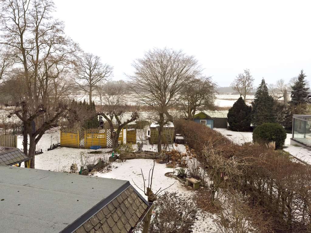 Immobilie in Steinburg - Attraktive 3-Zimmer-Wohnung mit Wintergarten und Gartenanteil - Bild 4