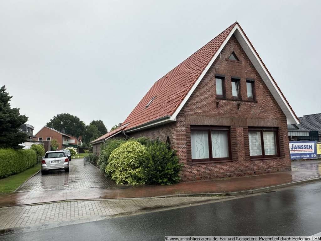 Immobilie in Apen - solides Klinkergebäude mit Garage und Wintergarten in Apen - Bild 0