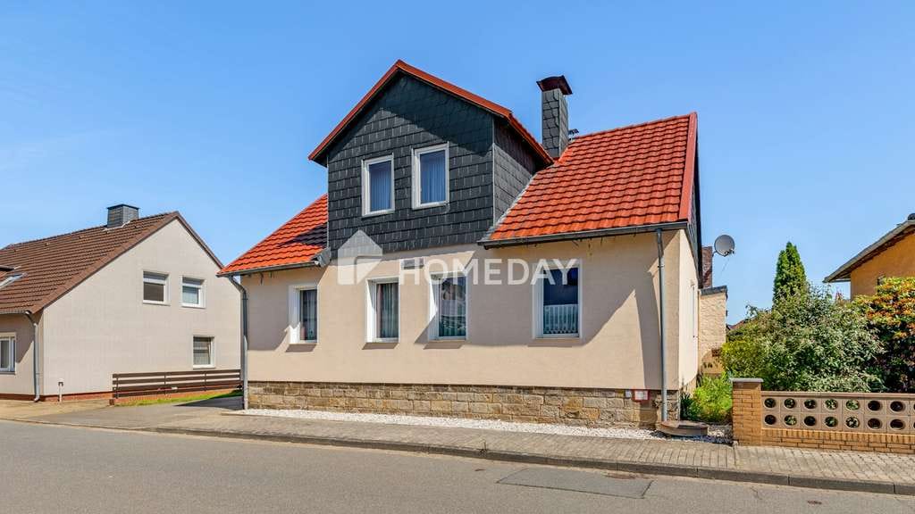 Immobilie in Grafhorst - Familienfreundliches Eigenheim mit Nebenhaus, Terrasse und Carport - Bild 0