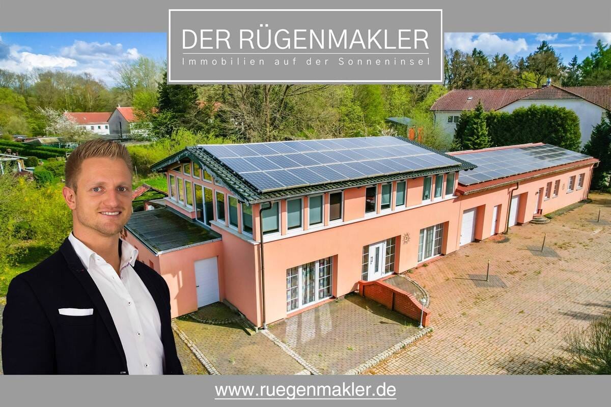 Immobilie in Putbus - Mehrfamilienhaus mit drei Wohnungen, Photovoltaik, Garagen oder möglicher Werkstatt in 18581 Putbus - Bild 0