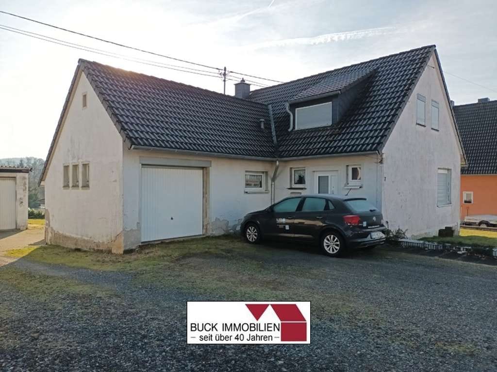 Immobilie in Steinebach an der Wied - Einfamilienwohnhaus mit 3 Garagen in ruhiger Aussichtslage von 57629 Wied - Bild 2