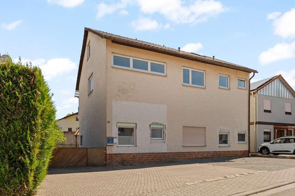 Immobilie in Lustadt - Leer stehendes und breitgefächertes Dreifamilienhaus - Bild 0