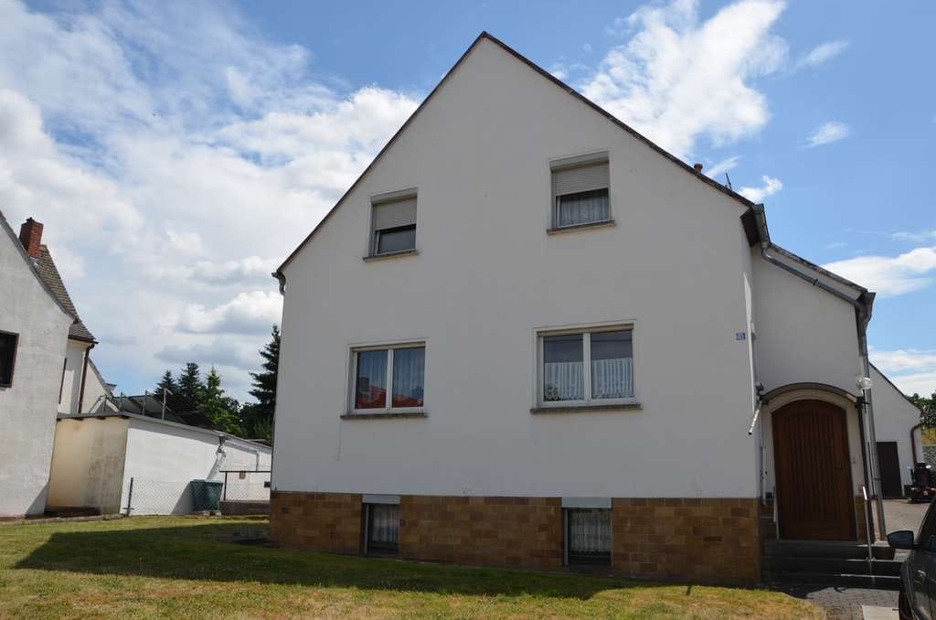 Immobilie in Grimma - Einfamilienhaus mit zwei Garagen in ruhiger Siedlungslage von Grimma OT Großbothen - Bild 2