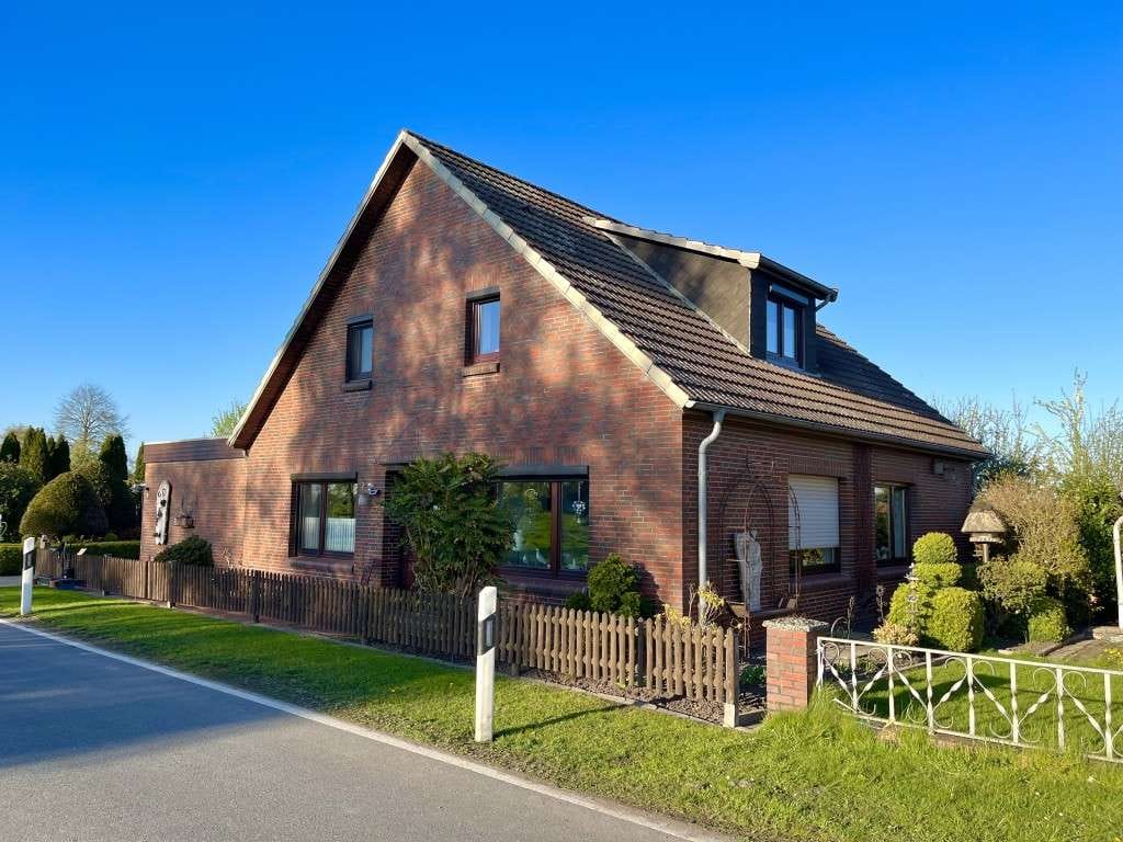 Immobilie in Stadland - Liebevoll gepflegtes Einfamilienhaus im Aussenbereich der Gem. Stadland - Bild 1