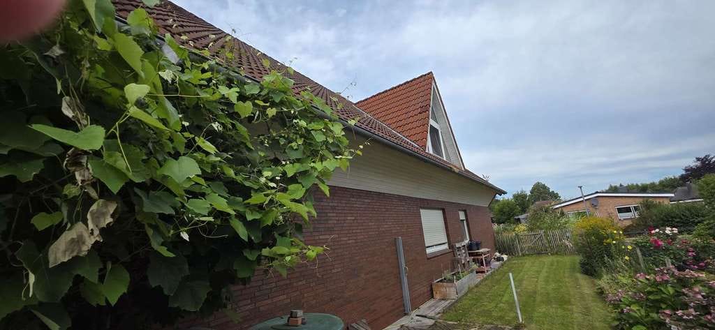 Immobilie in Ostrhauderfehn - „Investieren Sie in Geborgenheit: Zweifamilienhaus in familienfreundlicher Siedlung! - Bild 1