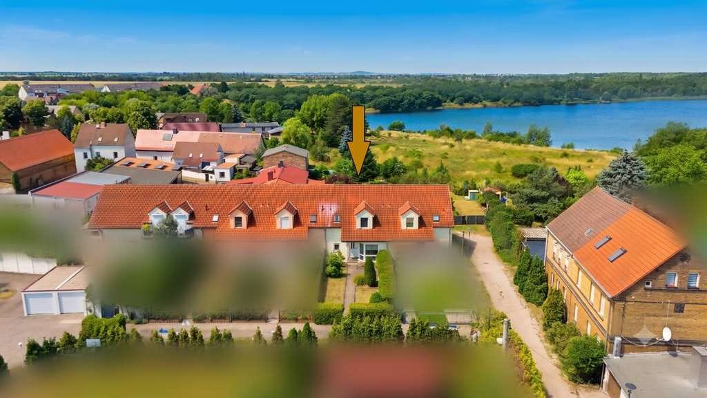 Immobilie in Sandersdorf-Brehna - Leben in Zscherndorf – familienfreundliches Reihenmittelhaus mit Terrasse, Garten und Garage - Bild 1