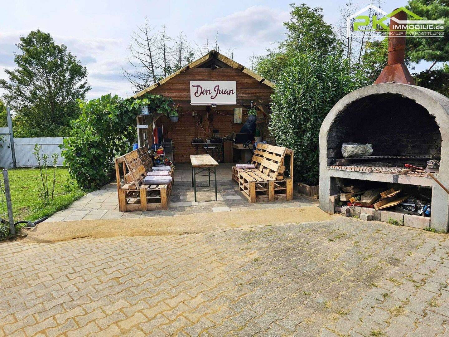 Immobilie in Bad Nauheim - Doppelhaus mit ausgebautem Untergeschoss großer Garage und Garten! TOP für selbständige Hadwerker! - Bild 2