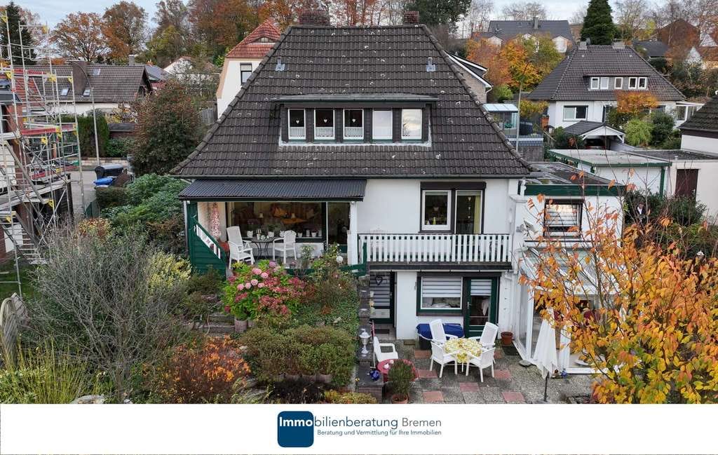 Immobilie in Ritterhude - Besichtigung am Freitag sichern! Einfamilienhaus auf attraktiven Hanggrundstück mit Carport - Bild 0