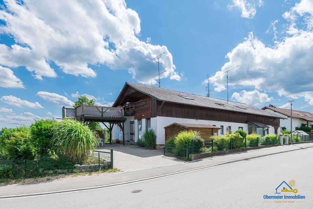 Immobilie in Ihrlerstein - Besonderes Einfamilienhaus mit Ferienapartments, Wintergarten, Sauna & Loggia und Blick auf Kelheim - Bild 0