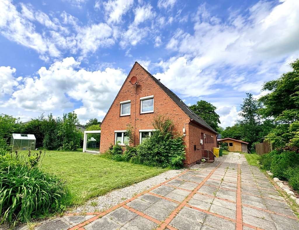Immobilie in Tetenbüll - Ruhe & Komfort - Hochwertig ausgestattetes Einfamilienhaus in idyllischer Lage - Bild 2