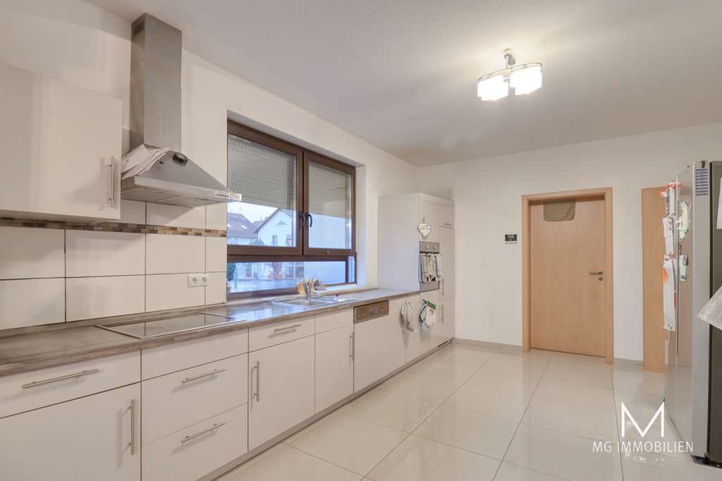 Immobilie in Hütschenhausen - MG - Vermietetes Einfamilienhaus mit Garten und Garage in Spesbach - Bild 1