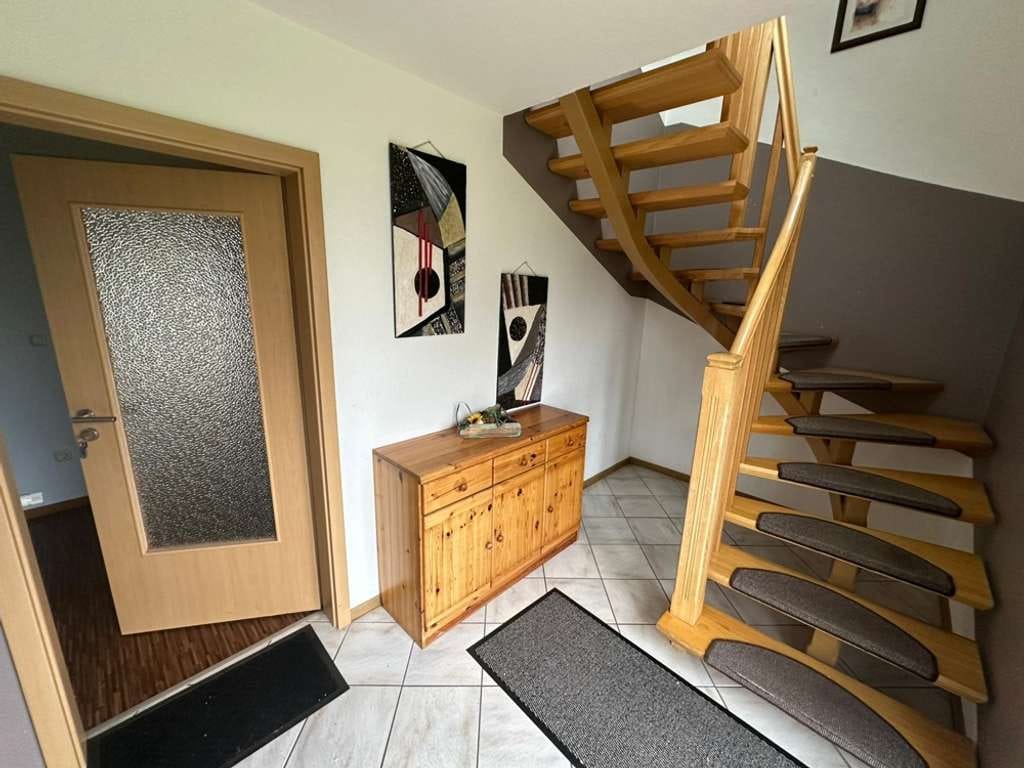 Immobilie in Rhauderfehn - Vielseitig nutzbares Mehrparteienhaus mit drei Wohneinheiten und ca. 250 m² Wohnfläche - Bild 1