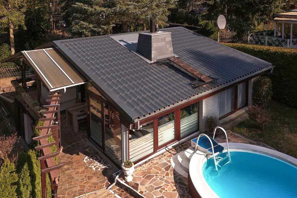 Immobilie in Schwielowsee - Urlaubsgefühl das ganze Jahr: Traumhafter Bungalow mit Pool und Gartenparadies - Bild 4