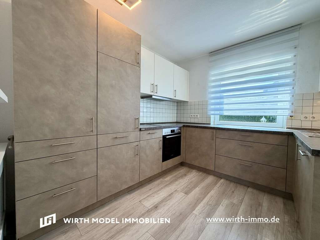 Immobilie in Geldersheim - Ansprechendes Reihenendhaus auf schönem Grundstück mit Garage in Idyllischer Ortsrandlage - Bild 2