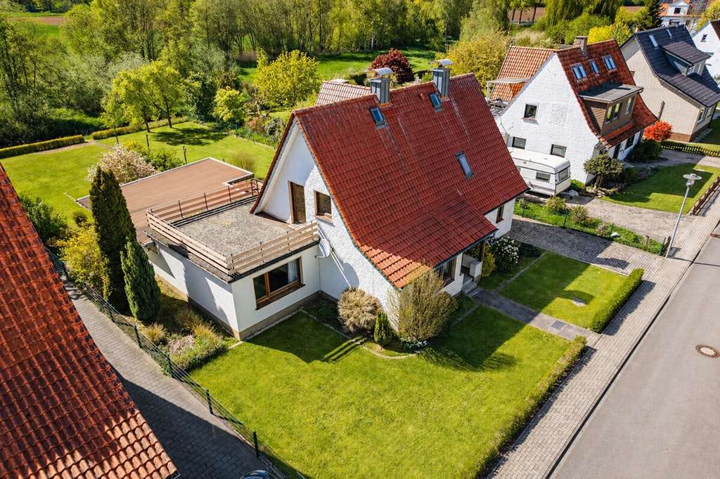 Immobilie in Bohmte - EFH in Bohmte: Modernisierungsobjekt mit großem Garten in Traumlage direkt an der Hunte! OPEN HOUSE! - Bild 0