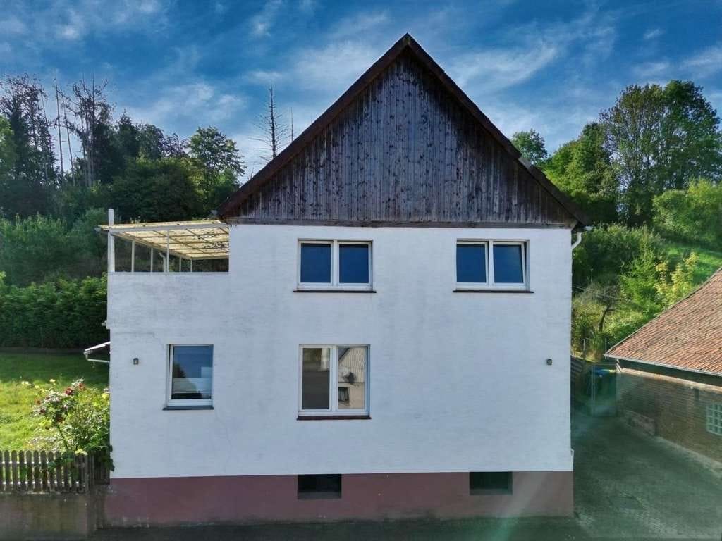 Immobilie in Brakel - Einfamilienhaus mit großem Garten - Bild 1