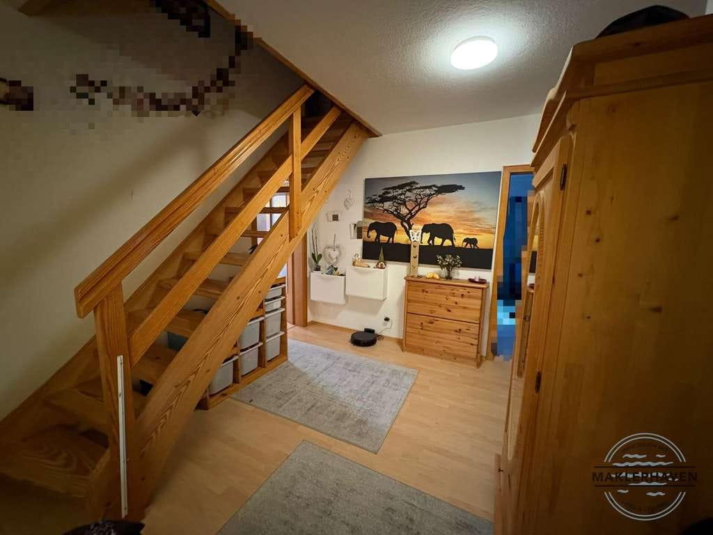 Immobilie in Zetel - Zweifamilienhaus mit Garten und Garage in Zetel zu verkaufen. - Bild 1