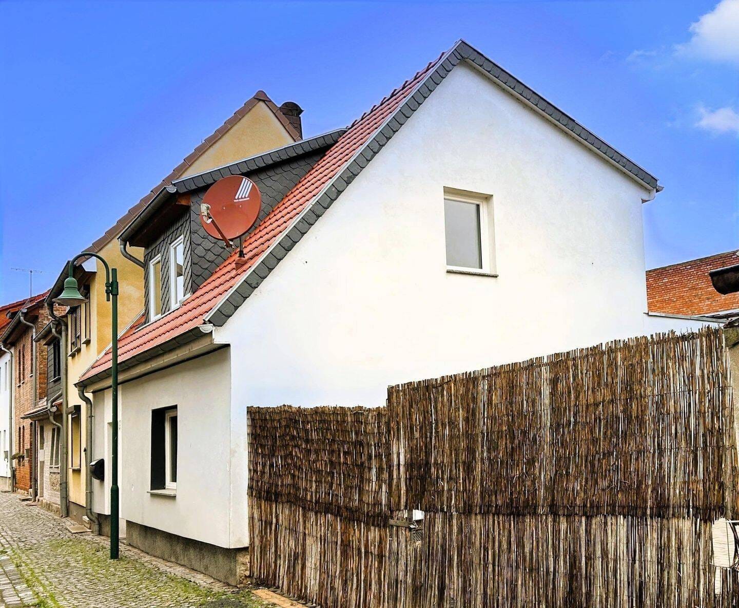 Immobilie in Artern - Modernes Einfamilienhaus mit Garten und Einbauküche - Bild 2